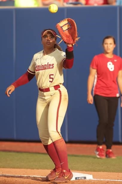 Taylon Snow of the Oklahoma Sooners makes a play at first base during the Division I Women's Softball Championship held at ASA Hall of Fame Stadium...