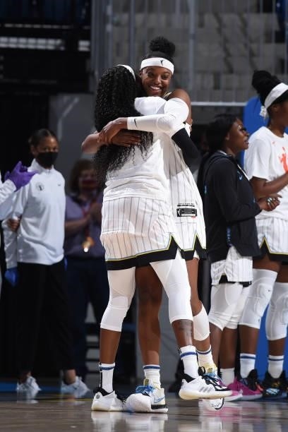 Diamond DeShields of the Chicago Sky hugs her teammate before the game against the Indiana Fever on June 9, 2021 at the Wintrust Arena in Chicago,...