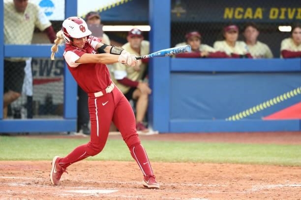 Mackenzie Donihoo of the Oklahoma Sooners hits against the Florida St. Seminoles during the Division I Women's Softball Championship held at ASA Hall...
