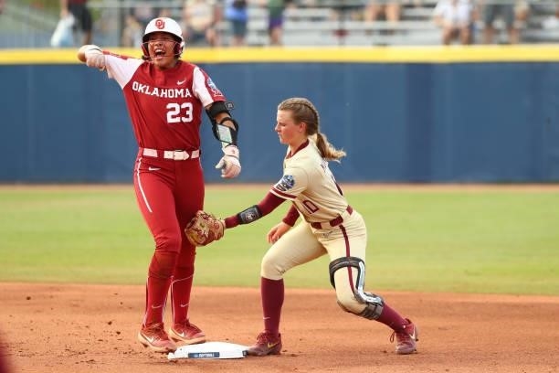 Tiare Jennings of the Oklahoma Sooners reacts to being safe at second against the Florida St. Seminoles during the Division I Women's Softball...