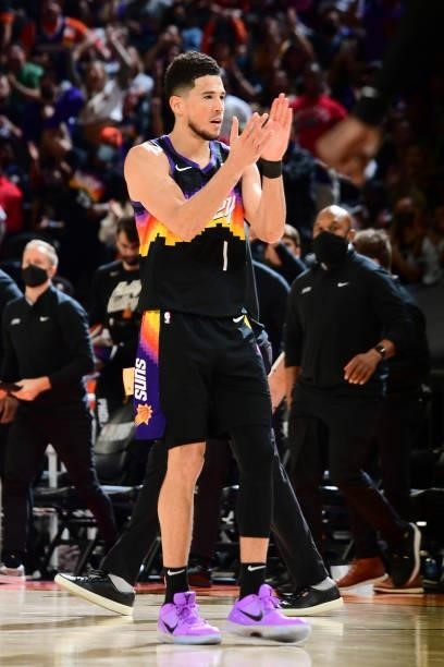 Devin Booker of the Phoenix Suns celebrates against the Denver Nuggets during Round 2, Game 2 of the 2021 NBA Playoffs on June 9, 2021 at Phoenix...
