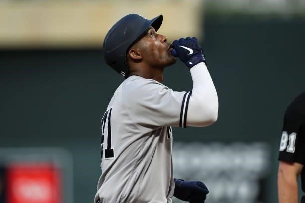 Miguel Andujar of the New York Yankees celebrates after hitting a solo home run against the Minnesota Twins in the fifth inning of the game at Target...