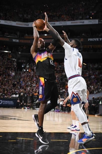 Torrey Craig of the Phoenix Suns drives to the basket against the Denver Nuggets during Round 2, Game 2 of the NBA Playoffs on June 9, 2021 at...