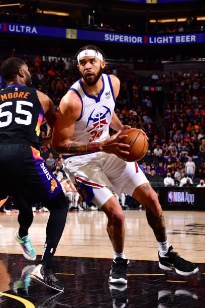 JaVale McGee of the Denver Nuggets drives to the basket during Round 2, Game 2 of the 2021 NBA Playoffs on June 9, 2021 at Phoenix Suns Arena in...