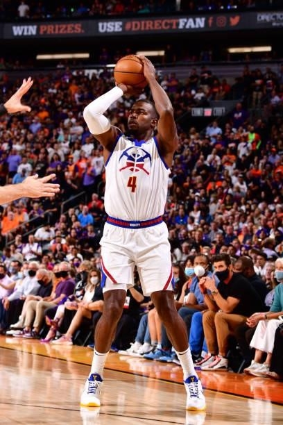 Paul Millsap of the Denver Nuggets shoots a three point basket during Round 2, Game 2 of the 2021 NBA Playoffs on June 9, 2021 at Phoenix Suns Arena...