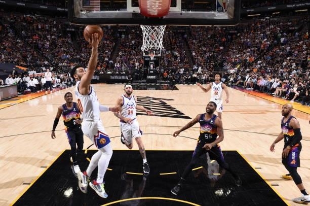 Markus Howard of the Denver Nuggets drives to the basket against the Phoenix Suns during Round 2, Game 2 of the NBA Playoffs on June 9, 2021 at...