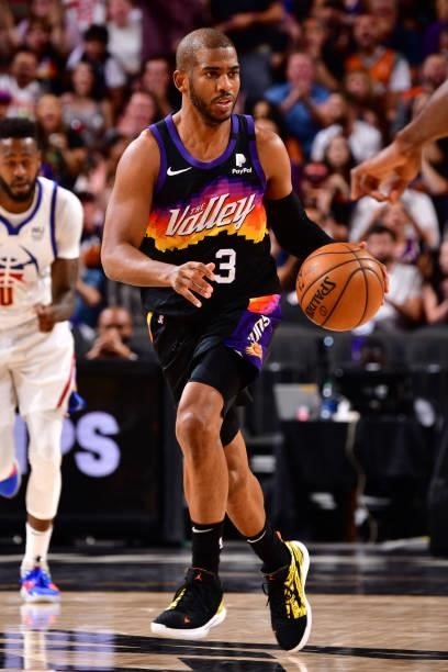 Chris Paul of the Phoenix Suns dribbles the ball during Round 2, Game 2 of the 2021 NBA Playoffs on June 9, 2021 at Phoenix Suns Arena in Phoenix,...