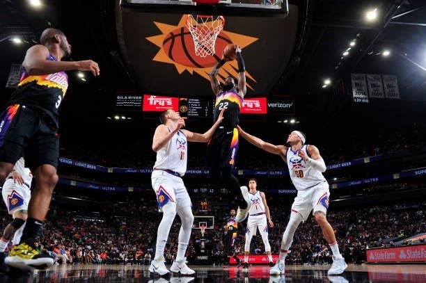 Deandre Ayton of the Phoenix Suns shoots the ball against the Denver Nuggets during Round 2, Game 2 of the 2021 NBA Playoffs on June 9, 2021 at...