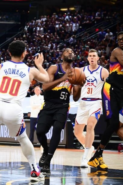 Twaun Moore of the Phoenix Suns drives to the basket against the Denver Nuggets during Round 2, Game 2 of the 2021 NBA Playoffs on June 9, 2021 at...