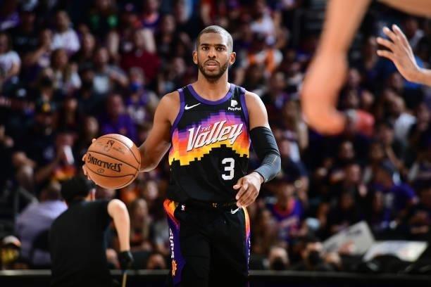 Chris Paul of the Phoenix Suns dribbles the ball against the Denver Nuggets during Round 2, Game 2 of the 2021 NBA Playoffs on June 9, 2021 at...