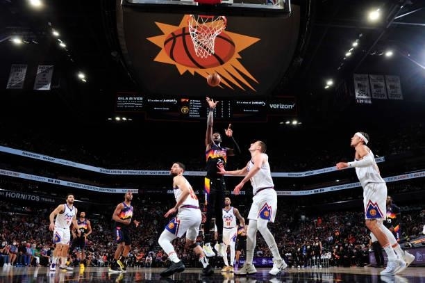 Deandre Ayton of the Phoenix Suns shoots the ball against the Denver Nuggets during Round 2, Game 2 of the 2021 NBA Playoffs on June 9, 2021 at...