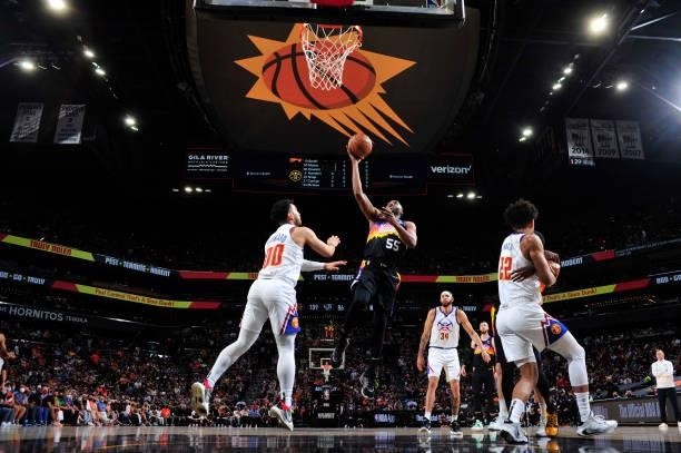 Twaun Moore of the Phoenix Suns shoots the ball against the Denver Nuggets during Round 2, Game 2 of the 2021 NBA Playoffs on June 9, 2021 at Phoenix...
