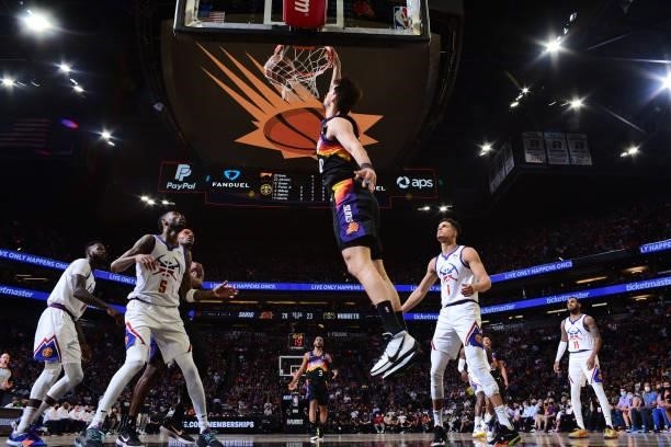 Dario Saric of the Phoenix Suns dunks the ball against the Denver Nuggets during Round 2, Game 2 of the 2021 NBA Playoffs on June 9, 2021 at Phoenix...