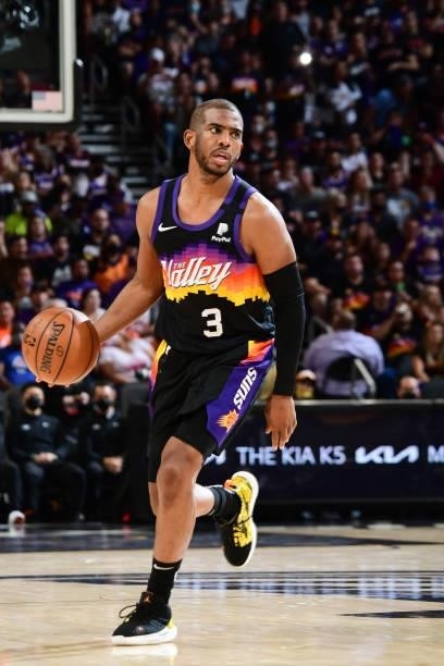 Chris Paul of the Phoenix Suns dribbles the ball against the Denver Nuggets during Round 2, Game 2 of the 2021 NBA Playoffs on June 9, 2021 at...
