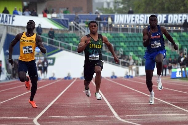 Micah Williams of the Oregon Ducks wins his heat in the 100-meter dash while racing against Joseph Amoah of the Coppin State Eagles, left, and Joseph...