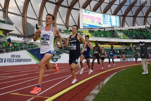 Athletes compete in the 10,000 meter run during the Division I Men's and Women's Outdoor Track & Field Championships held at Hayward Field on June 9,...