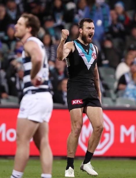 Charlie Dixon of the Power celebrates a goal during the 2021 AFL Round 13 match between the Port Adelaide Power and the Geelong Cats at Adelaide Oval...