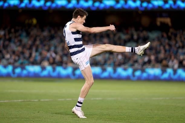 Jeremy Cameron of the Cats kicks a goal during the 2021 AFL Round 13 match between the Port Adelaide Power and the Geelong Cats at Adelaide Oval on...