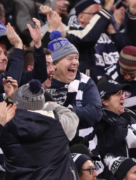 Cats fans celebrates a goal during the 2021 AFL Round 13 match between the Port Adelaide Power and the Geelong Cats at Adelaide Oval on June 10, 2021...