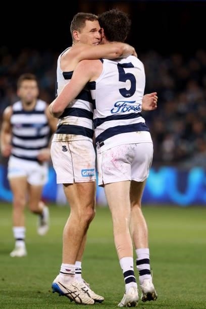 Joel Selwood and Jeremy Cameron of the Cats celebrate a goal during the 2021 AFL Round 13 match between the Port Adelaide Power and the Geelong Cats...