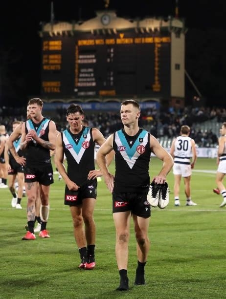 Robbie Gray of the Power and Connor Rozee after the loss during the 2021 AFL Round 13 match between the Port Adelaide Power and the Geelong Cats at...
