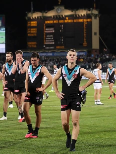 Robbie Gray of the Power and Connor Rozee after the loss during the 2021 AFL Round 13 match between the Port Adelaide Power and the Geelong Cats at...