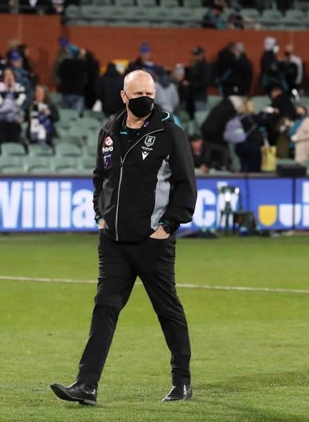 Ken Hinkley, Senior Coach of the Power leaves the oval after the loss during the 2021 AFL Round 13 match between the Port Adelaide Power and the...