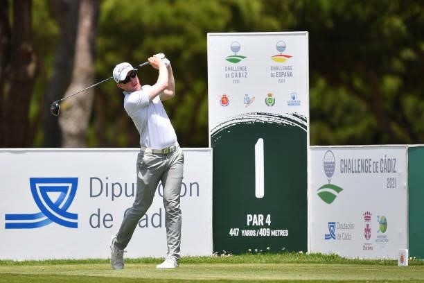 Euan Walker of Scotland tees off on the first hole during Day One of the Challenge de Cadiz at Iberostar Real Club de Golf Novo Sancti Petri on June...