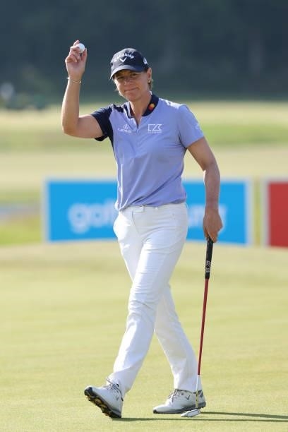 Annika Sorenstam of Sweden acknowledges the crowd on the 18th green during the first round of The Scandinavian Mixed Hosted by Henrik and Annika at...