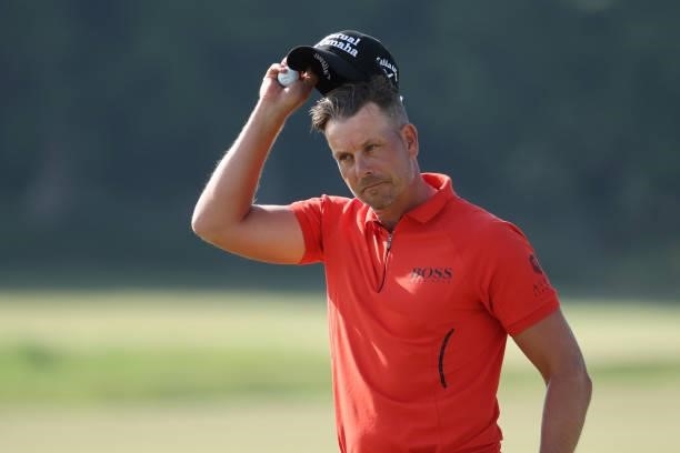 Henrik Stenson of Sweden acknowledges the crowd on the 18th green during the first round of The Scandinavian Mixed Hosted by Henrik and Annika at...