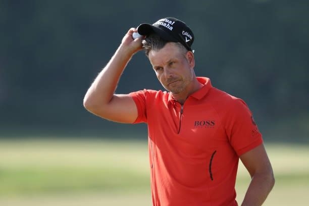 Henrik Stenson of Sweden acknowledges the crowd on the 18th green during the first round of The Scandinavian Mixed Hosted by Henrik and Annika at...
