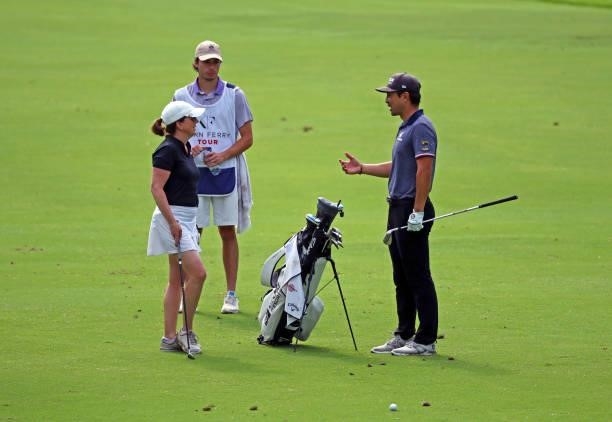 Alex Kang speaks with playing partner Becky Sanderson on the 12th hole during the first round of the BMW Charity Pro-Am presented by Synnex...