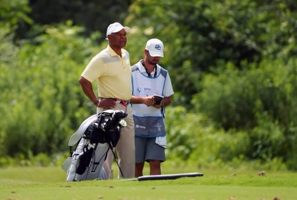 Ozzie Smith gets ready to play a shot on the 12th hole during the first round of the BMW Charity Pro-Am presented by Synnex Corporation at the...