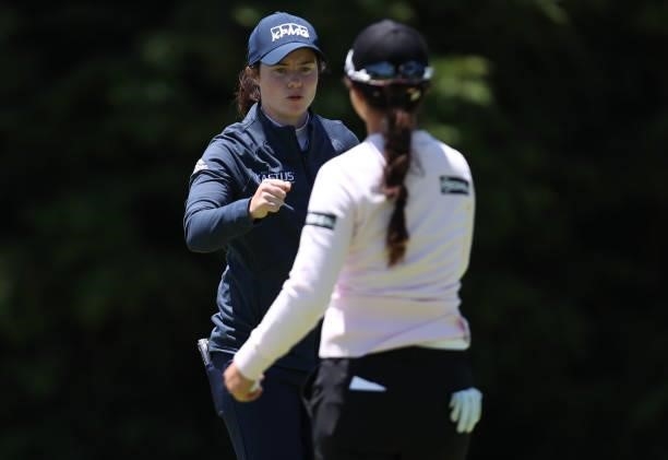 Leona Maguire of Ireland is congratulated by Sei Young Kim of South Korea after finishing her round on the 9th hole during the first round of the...