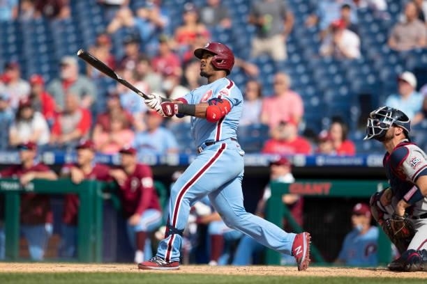 Jean Segura of the Philadelphia Phillies hits a walk-off two RBI single in the bottom of the tenth inning against the Atlanta Braves at Citizens Bank...