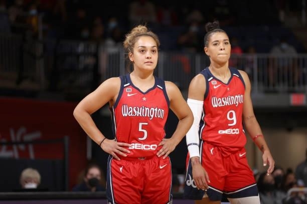 Leilani Mitchell and Natasha Cloud of the Washington Mystics looks on during the game against the Los Angeles Sparks on June 10, 2021 at...