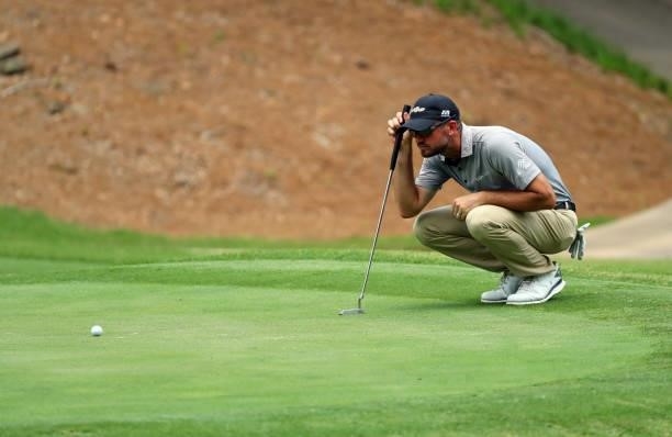 Brandon Crick lines up his putt on the fourth hole during the first round of the BMW Charity Pro-Am presented by Synnex Corporation at the Thornblade...