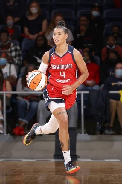 Natasha Cloud of the Washington Mystics handles the ball against the Los Angeles Sparks on June 10, 2021 at Entertainment & Sports Arena in...