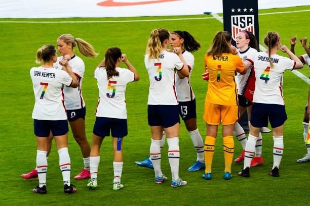 The United States Women's National Team high five prior to the 2021 WNT Summer Series friendly against Portugal at BBVA Stadium on June 10, 2021 in...