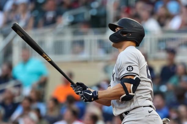 Giancarlo Stanton of the New York Yankees hits a three-run home run against the Minnesota Twins in the first inning of the game at Target Field on...