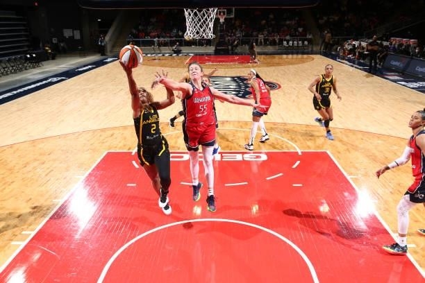 Te'a Cooper of the Los Angeles Sparks drives to the basket against the Washington Mystics on June 10, 2021 at Entertainment & Sports Arena in...