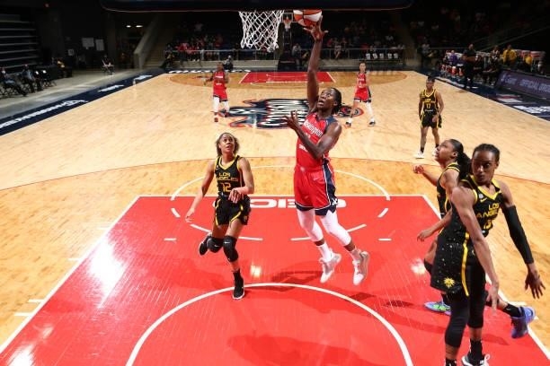 Tina Charles of the Washington Mystics drives to the basket against the Los Angeles Sparks on June 10, 2021 at Entertainment & Sports Arena in...