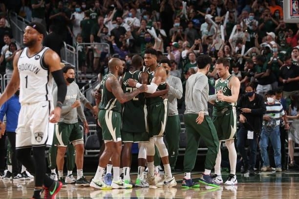 The Milwaukee Bucks celebrate after winning Round 2, Game 3 of the 2021 NBA Playoffs against the Brooklyn Nets on June 10, 2021 at the Fiserv Forum...