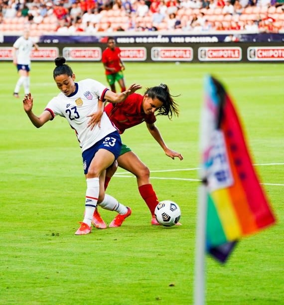 Christen Press of the United States battles Francisca Nazareth of Portugal for the ball during the first half of the 2021 WNT Summer Series friendly...