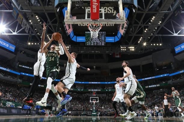 Blake Griffin of the Brooklyn Nets blocks the shot of Giannis Antetokounmpo of the Milwaukee Bucks during Round 2, Game 3 of the 2021 NBA Playoffs on...