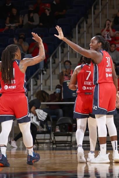 Tina Charles and Shavonte Zellous of the Washington Mystics high five during the game against the Los Angeles Sparks on June 10, 2021 at...