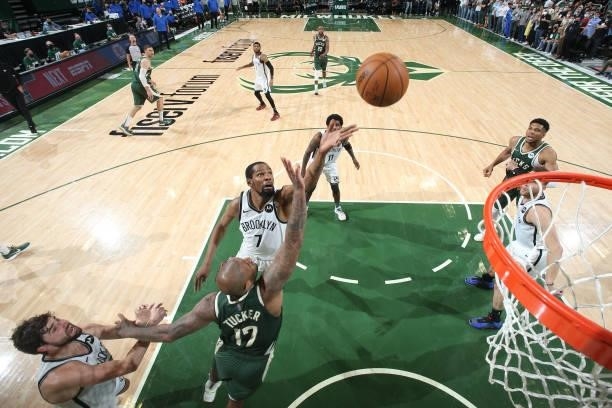 Kevin Durant of the Brooklyn Nets rebounds the ball against the Milwaukee Bucks during Round 2, Game 3 of the 2021 NBA Playoffs on June 10, 2021 at...