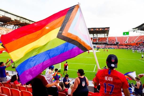 Fans wave flags representing support for the LBGTQIA+ community before the 2021 WNT Summer Series friendly between Portugal and the United States at...