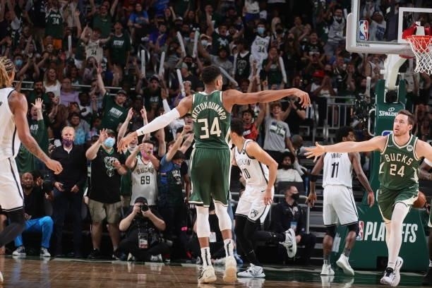 Giannis Antetokounmpo of the Milwaukee Bucks celebrates during Round 2, Game 3 of the 2021 NBA Playoffs on June 10, 2021 at the Fiserv Forum Center...