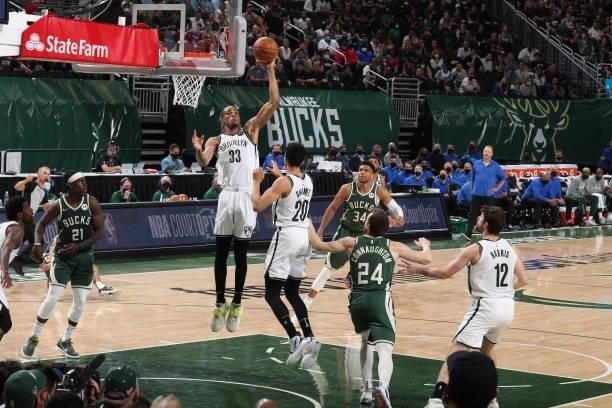 Nicolas Claxton of the Brooklyn Nets rebounds the ball against the Milwaukee Bucks during Round 2, Game 3 of the 2021 NBA Playoffs on June 10, 2021...